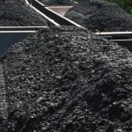 An Image Of Black Coal Transmitting Via Train.